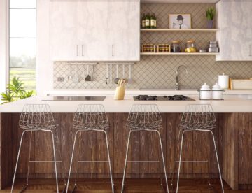 four gray bar stools in front of kitchen countertop