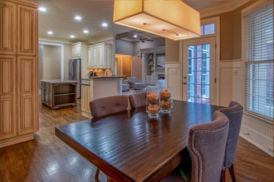 brown wooden table with chairs