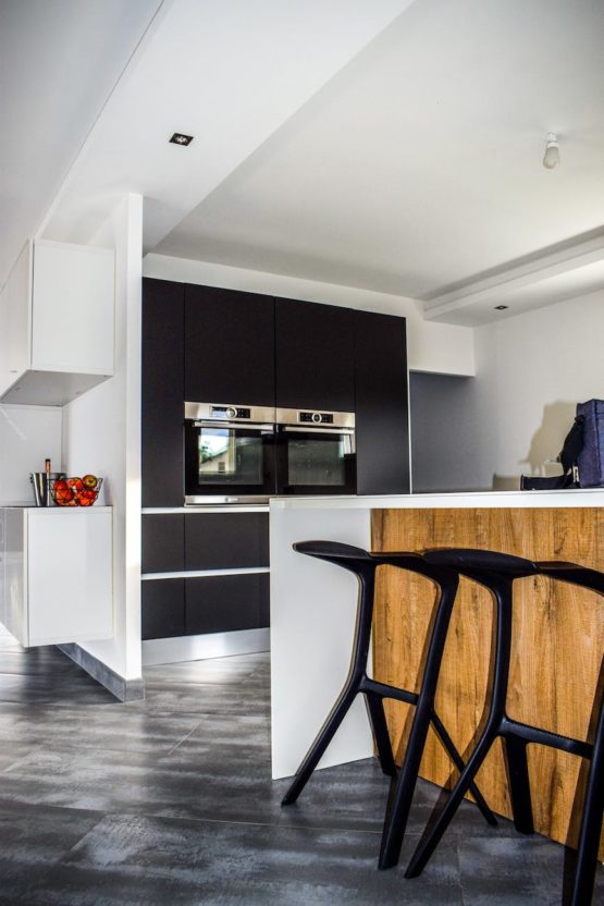 two black wooden bar stools