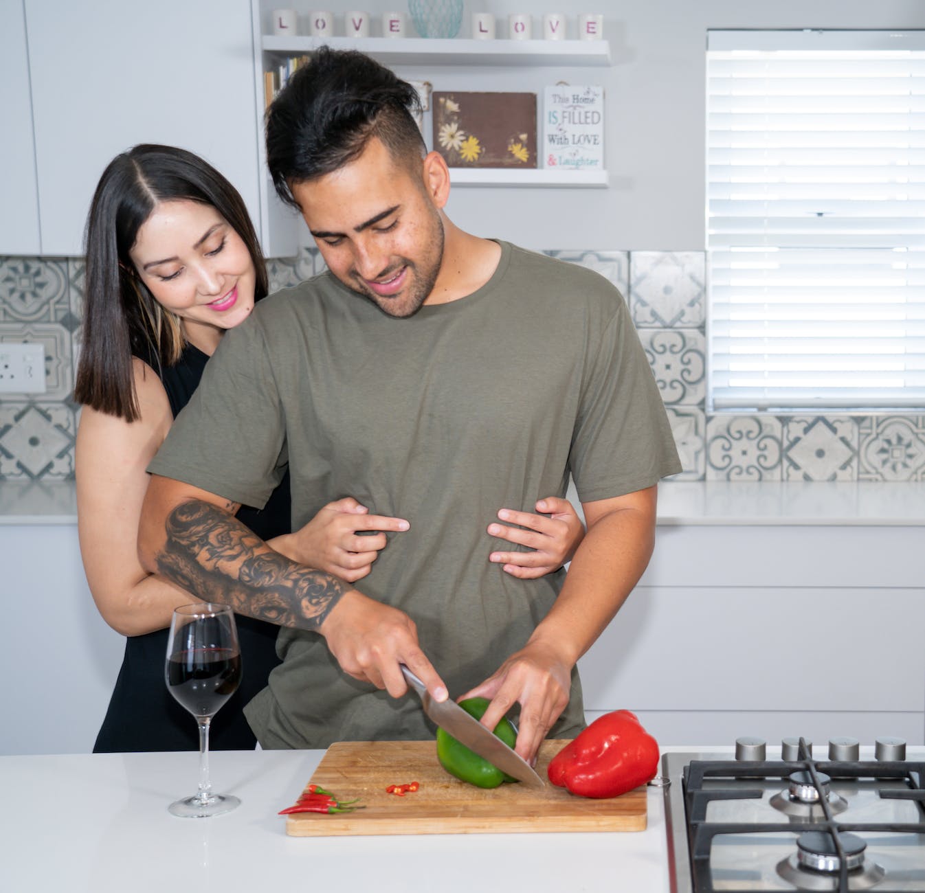 couple together in kitchen