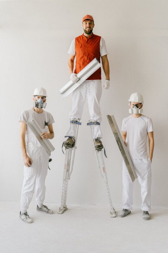 full shot of construction workers at work