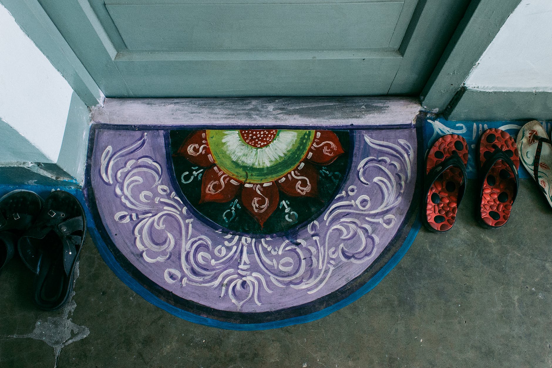 colourful picture of oriental rug on floor near front door