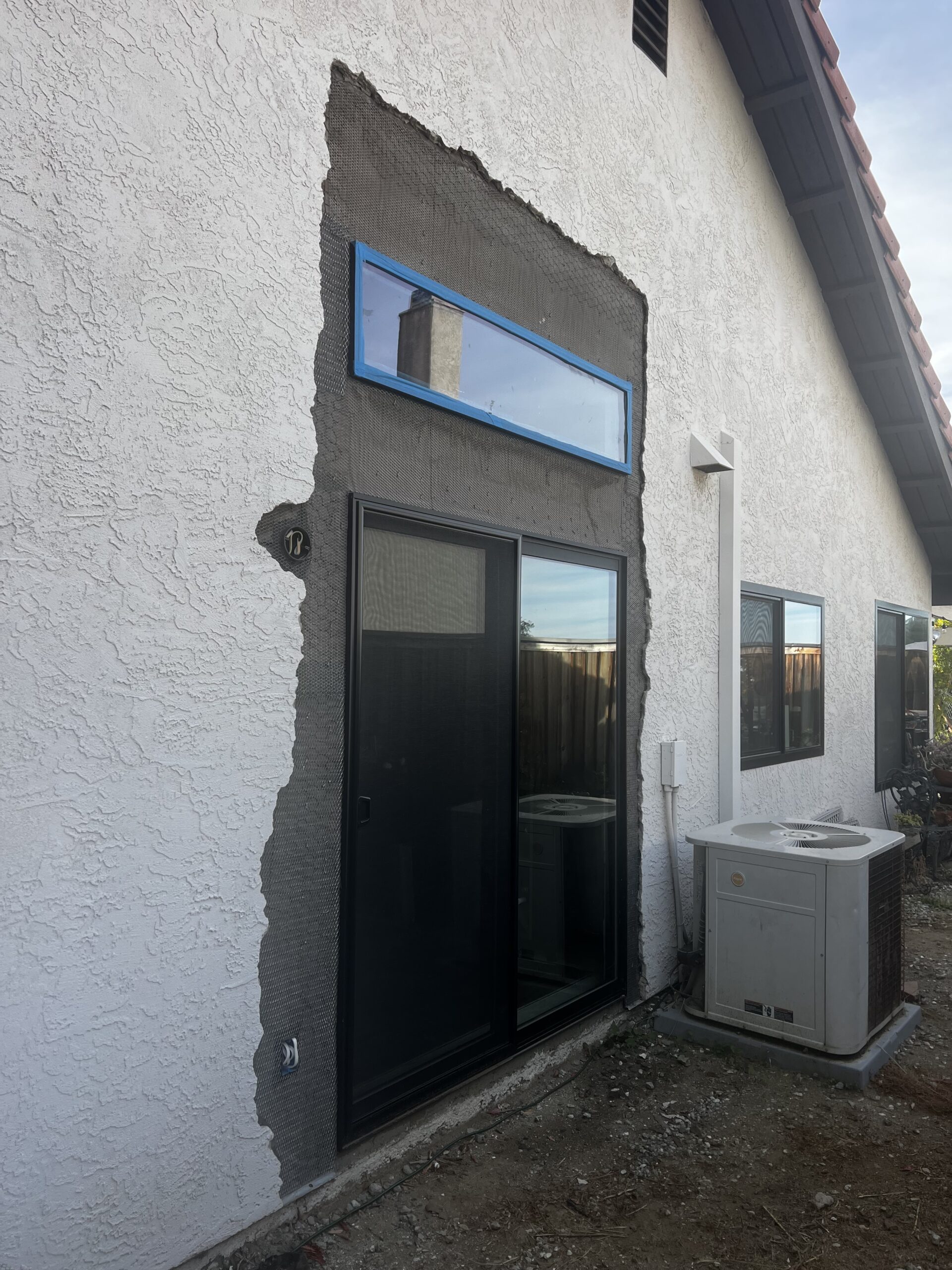 Stucco repair around back door