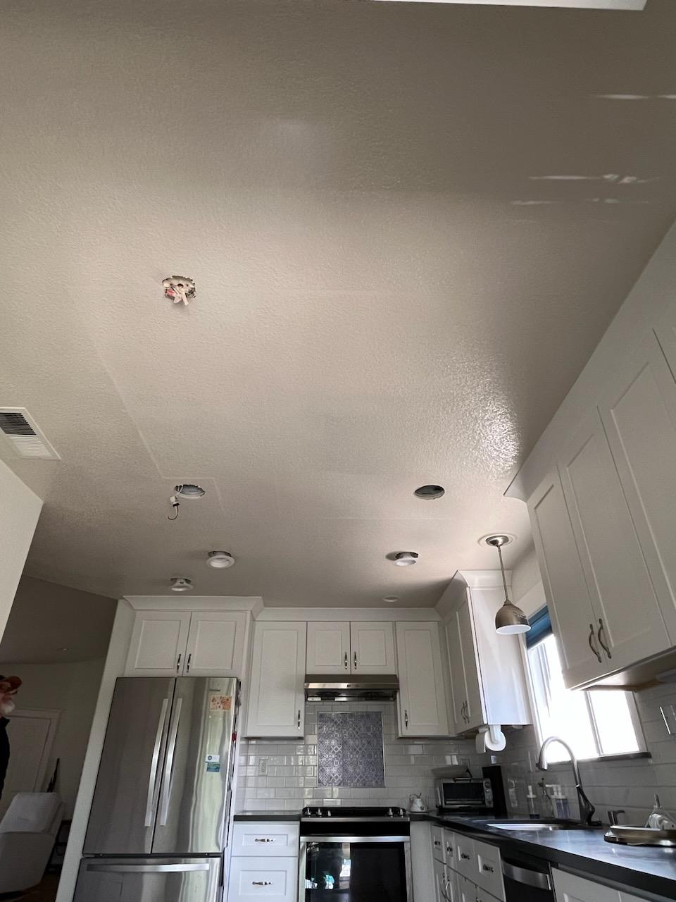 Ceiling drywall repair in kitchen after