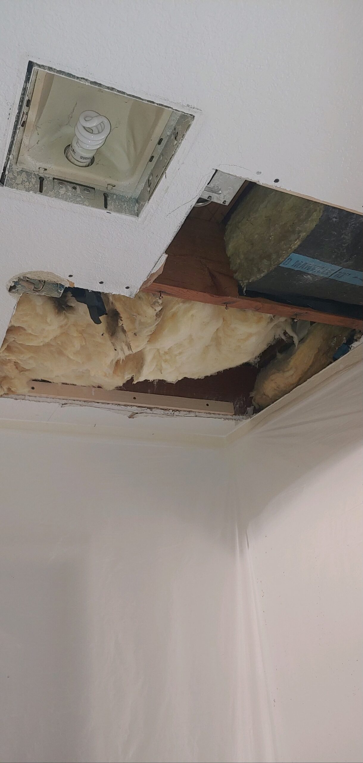 Ceiling water damage drywall repair before