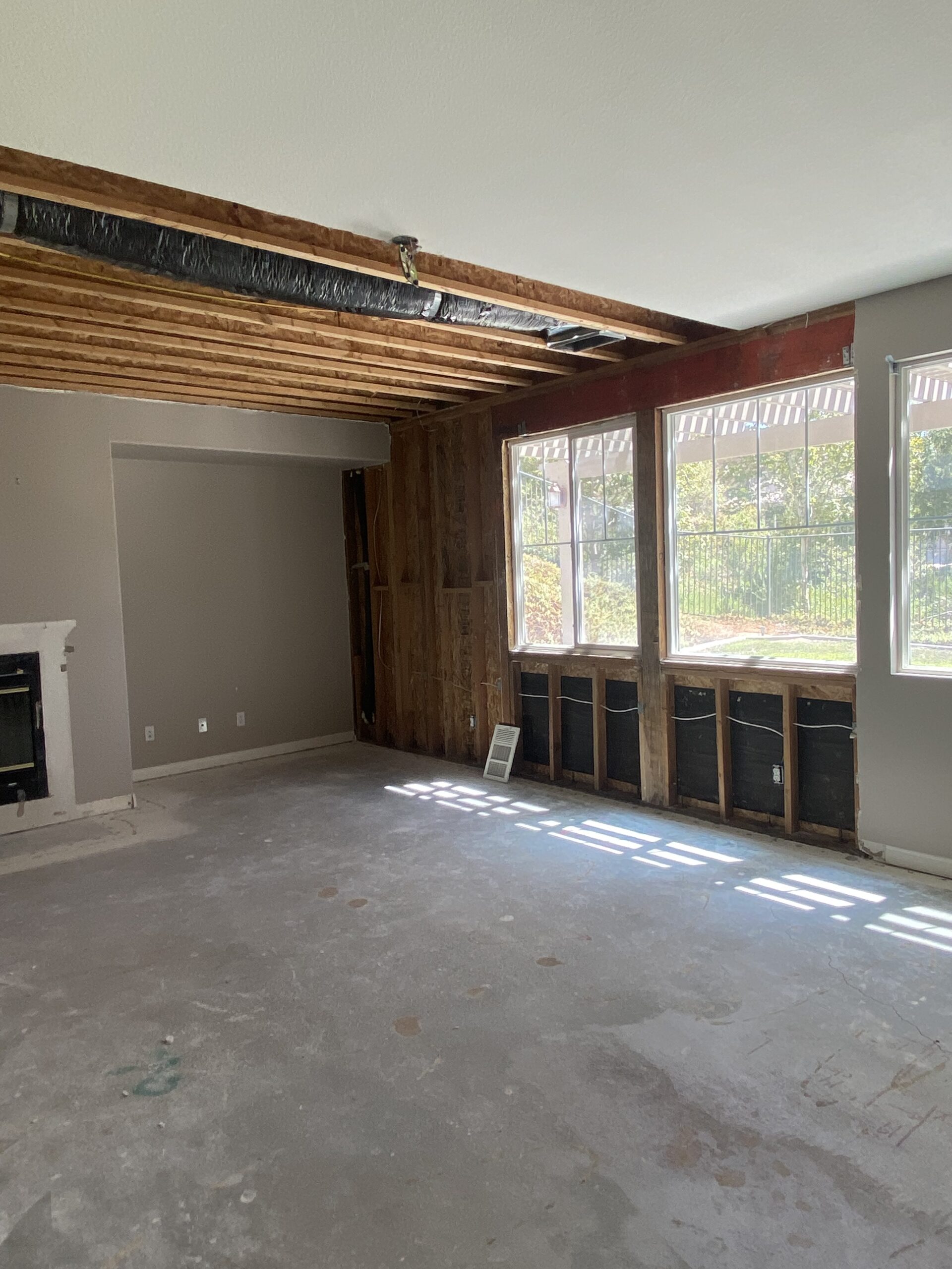 Living room ceiling and wall drywall repair before