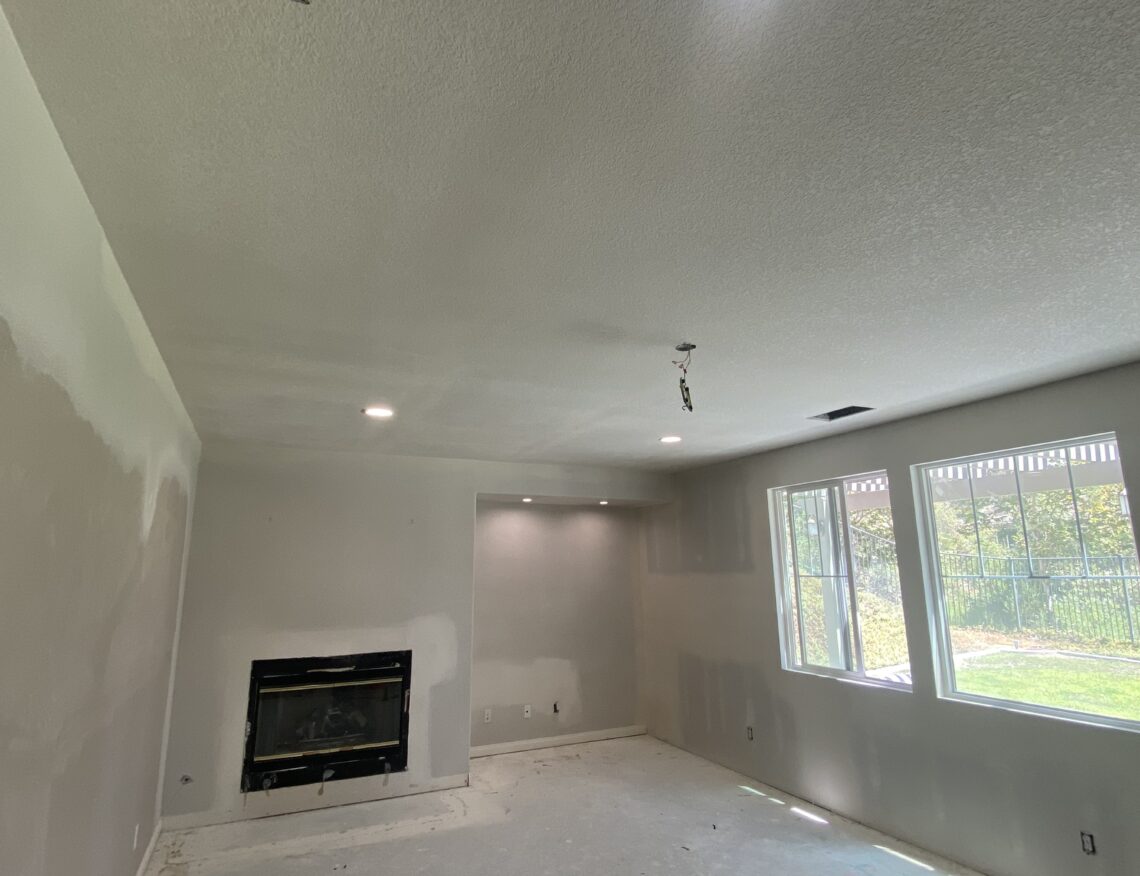 Living room ceiling and wall drywall repair after