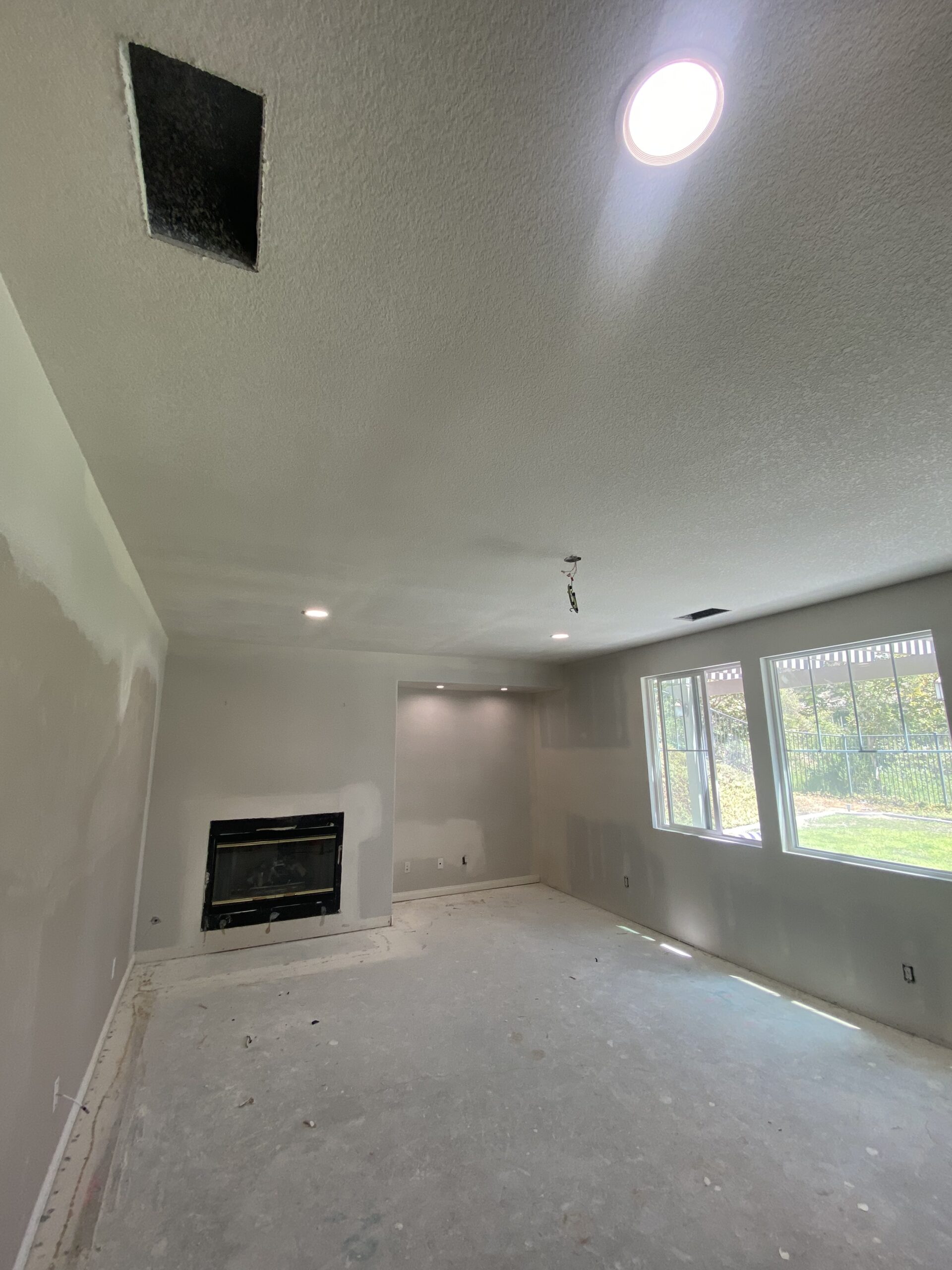 Living room ceiling and wall drywall repair after