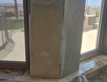 After smooth drywall repair in kitchen