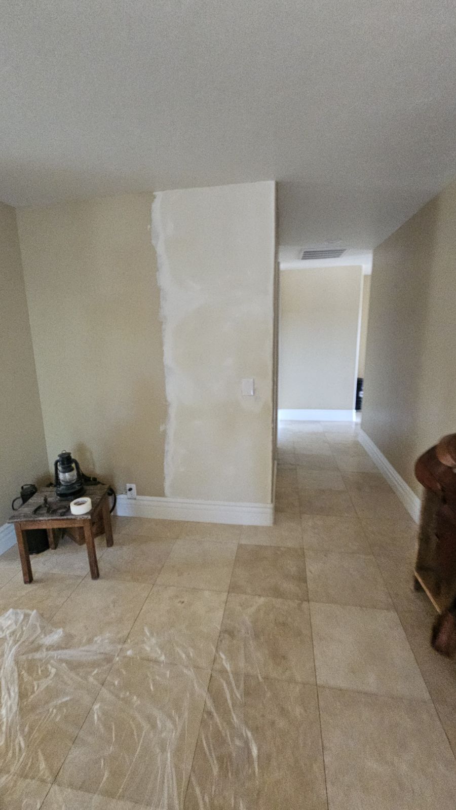 Smooth texture drywall repair after