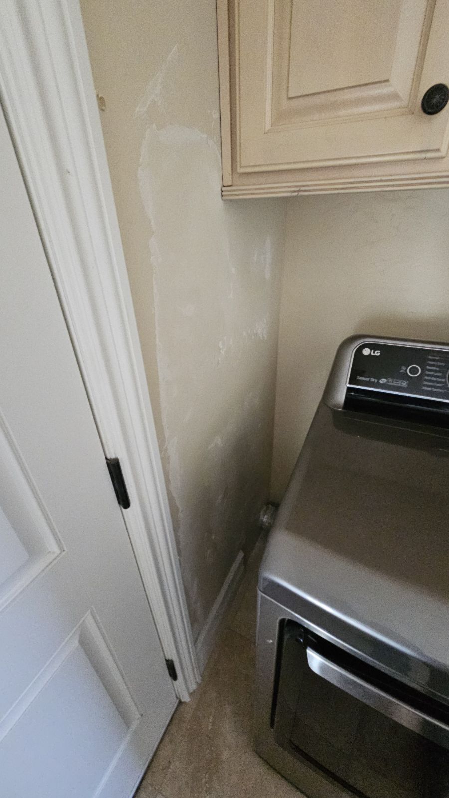 Smooth texture drywall repair in laundry room after