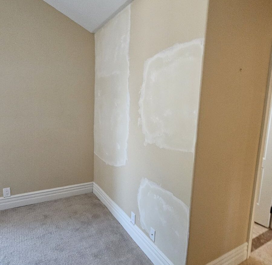 Living room smooth texture drywall repair after