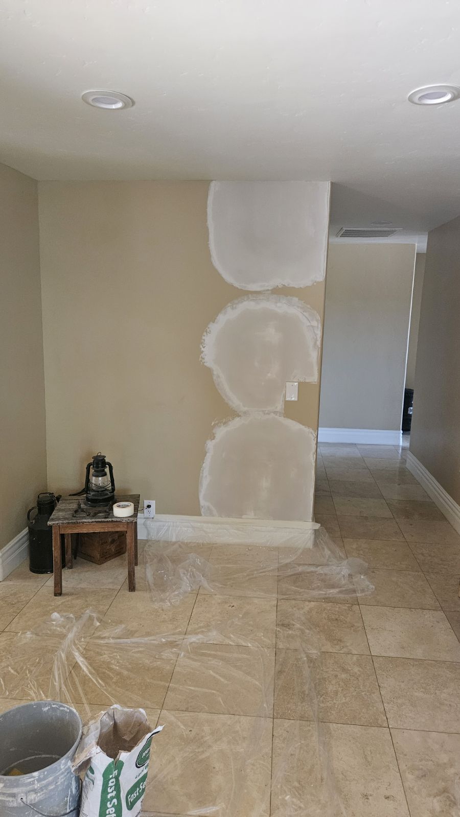 Smooth texture wall repair before 