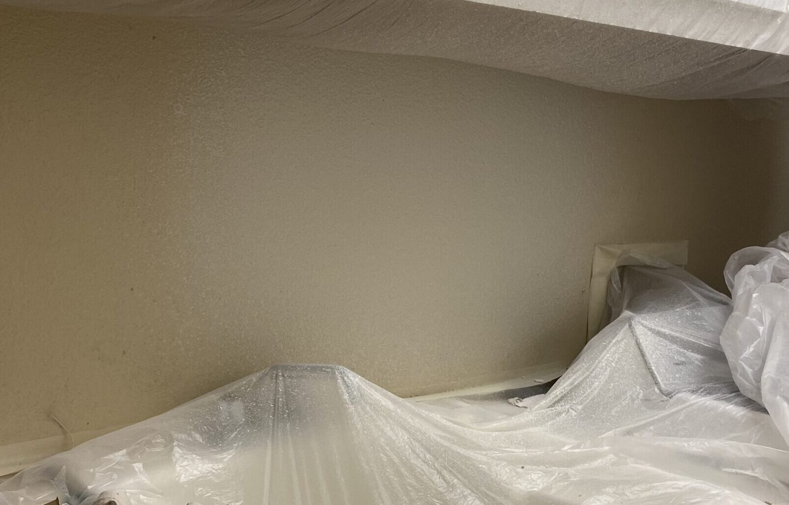 Drywall repair in laundry room wall after