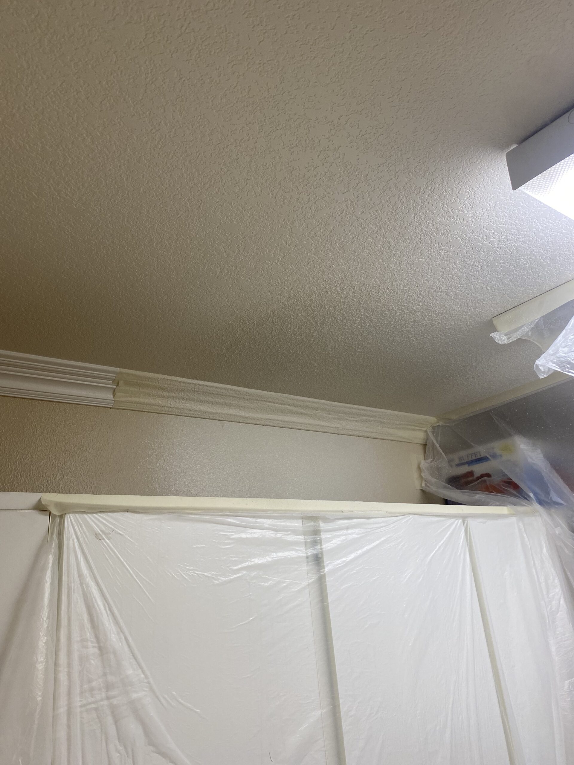 Drywall repairs in laundry room after