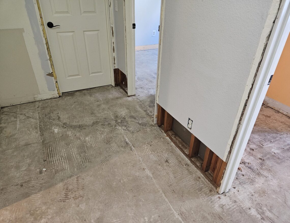 Hallway drywall repair before