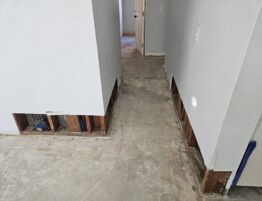 Hallway drywall repair before