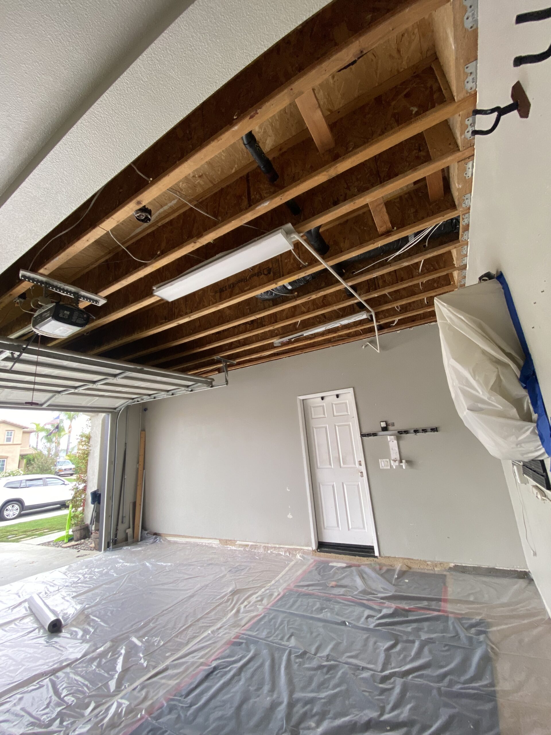 Garage ceiling drywall repair before in Menifee ca